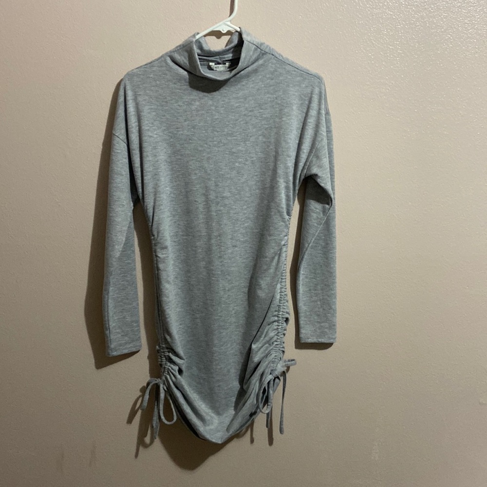 Grey, fitted, turtle neck long sleeve dress.